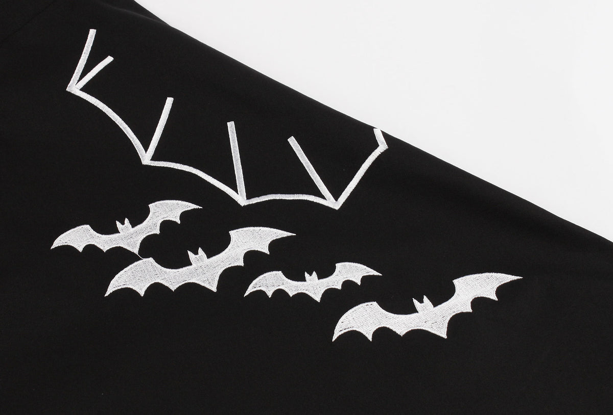 Bat embroidered dress