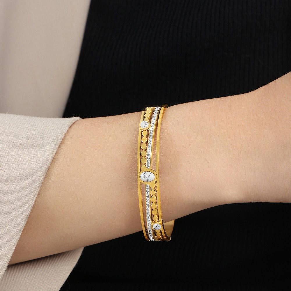 Trendy and fashionable 18k gold inlaid turquoise and zircon hollow design versatile bracelet