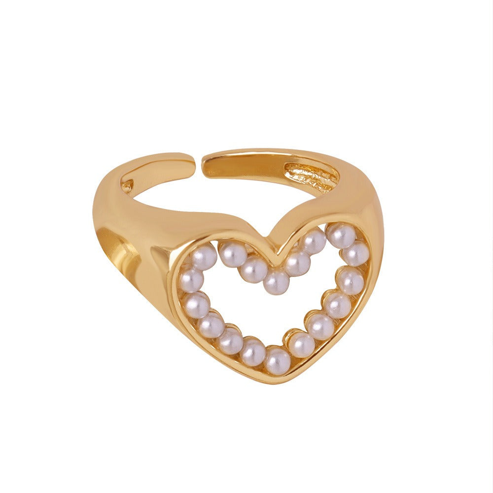 18K gold exquisite and novel hollow love heart inlaid pearl design ring