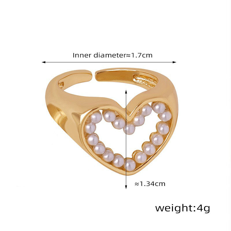 18K gold exquisite and novel hollow love heart inlaid pearl design ring